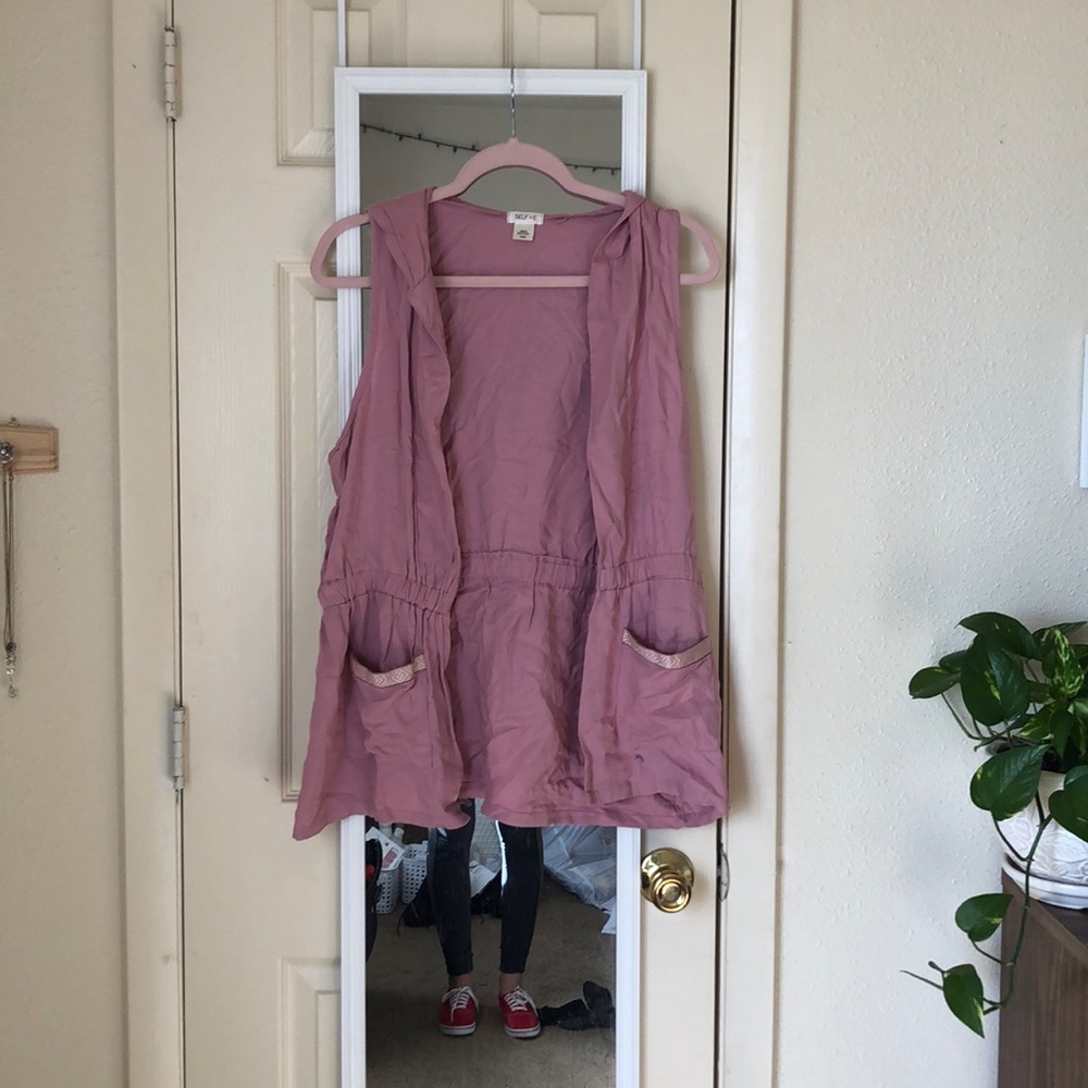 Pink sleeveless jacket
